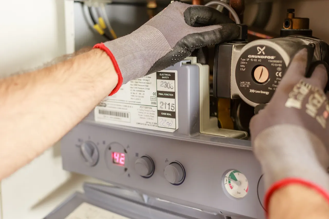 Control panel of a wall-mounted water heating unit